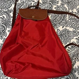 Excellent condition!  Longchamp Le Pliage Nylon Backpack in a vibrant Red